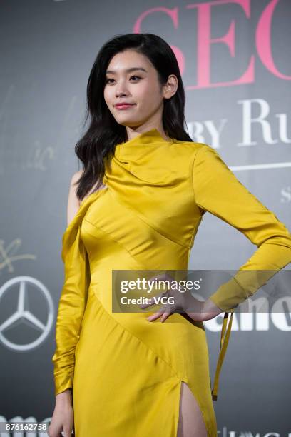 Victoria's Secret Angel Ming Xi arrives at the red carpet of the Mercedes-Benz 'Backstage Secrets' By Russell James - Book Launch & Shanghai...