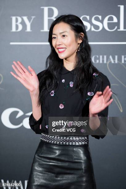 Victoria's Secret Angel Liu Wen poses at the red carpet of the Mercedes-Benz 'Backstage Secrets' By Russell James - Book Launch & Shanghai Exhibition...