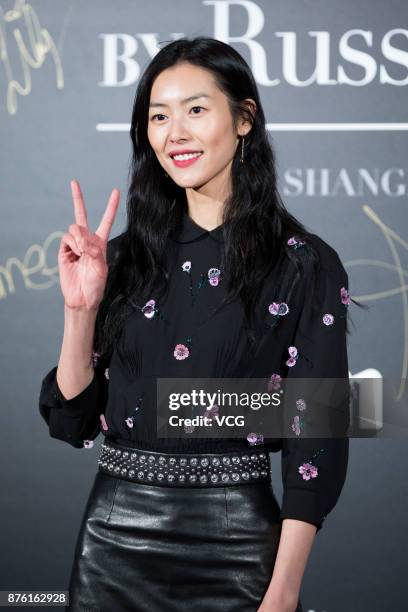 Victoria's Secret Angel Liu Wen poses at the red carpet of the Mercedes-Benz 'Backstage Secrets' By Russell James - Book Launch & Shanghai Exhibition...
