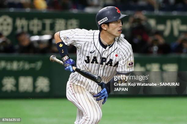 Infielder Shuta Tonosaki of Japan hits a RBI double to make it 1-0 in the bottom of fourth inning during the Eneos Asia Professional Baseball...