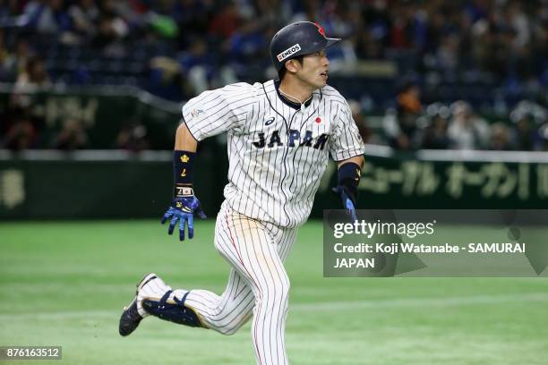 Infielder Shuta Tonosaki of Japan hits a RBI double to make it 1-0 in the bottom of fourth inning during the Eneos Asia Professional Baseball...