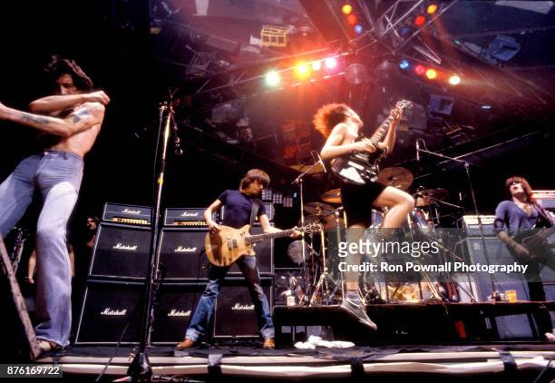 October 1978: AC/DC performs at the Orpheum Theater, in Boston, Massachusetts, October 9, 1978 Bon Scott, Malcolm Young, Phil Rudd, Angus Young,...
