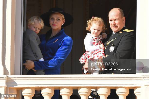 Princess Charlene of Monaco with Prince Jacques of Monaco and Prince Albert II of Monaco with Princess Gabriella of Monaco greet the crowd from the...