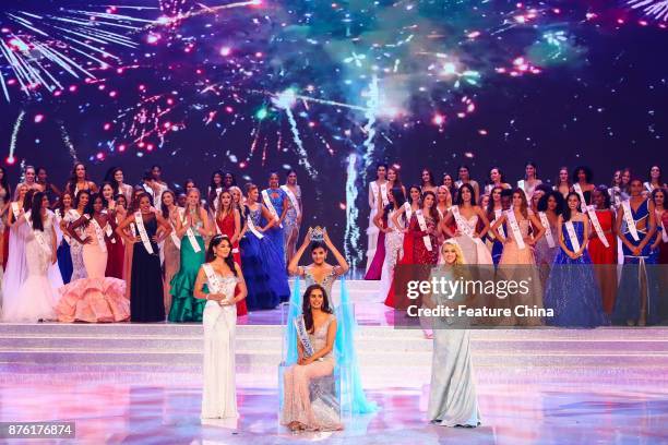 Puerto Rican musician and Miss World 2016 Stephanie Del Valle crowns Manushi Chhillar of India in the award ceremony of Miss World 2017 in Sanya in...