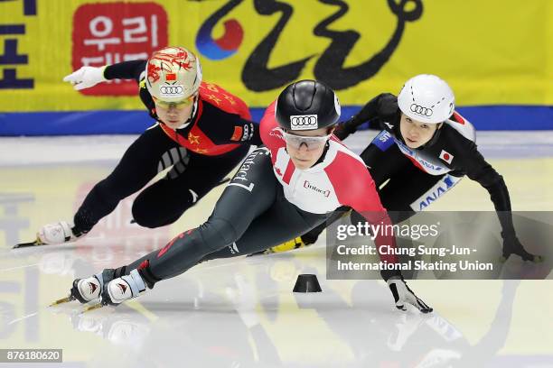 Jamie Macdonald of Canada, Yutong Han of China and Hitomi Saito of Japan compete in the Ladies 1000m Final B during the Audi ISU World Cup Short...