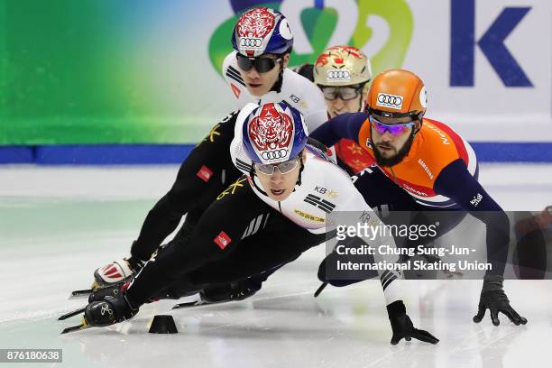 Hwang Dae-Heon of South Korea and Sjinkie Knegt of Netherlands compete in the Men 1000m Semifinals during the Audi ISU World Cup Short Track Speed...