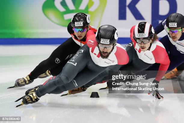 Charles Hamelin of Canada and Samuel Girard of Canada compete in the Men 1000m Semifinals during the Audi ISU World Cup Short Track Speed Skating at...