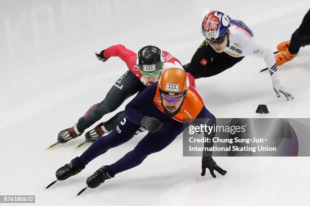 Sjinkie Knegt of Netherlands, Charle Cournoyer of Canada and Seo Yi-Ra of South Korea compete in the Men 1000m Quarterfinals during during the Audi...