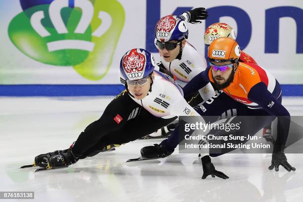 Hwang Dae-Heon of South Korea and Sjinkie Knegt of Netherlands compete in the Men 1000m Semifinals during the Audi ISU World Cup Short Track Speed...