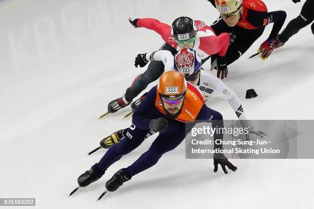 Sjinkie Knegt of Netherlands, Charle Cournoyer of Canada and Seo Yi-Ra of South Korea compete in the Men 1000m Quarterfinals during during the Audi...