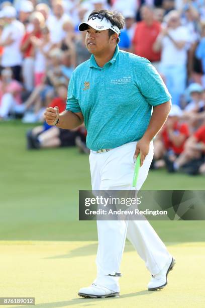 Kiradech Aphibarnrat of Thailand celebrates on the 18th green during the final round of the DP World Tour Championship at Jumeirah Golf Estates on...