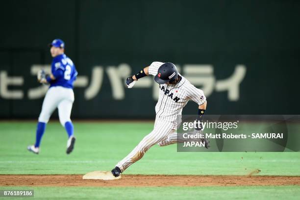 Infielder Shuta Tonosaki of Japan runs the second base to score a run in the bottom of fifth inning during the Eneos Asia Professional Baseball...