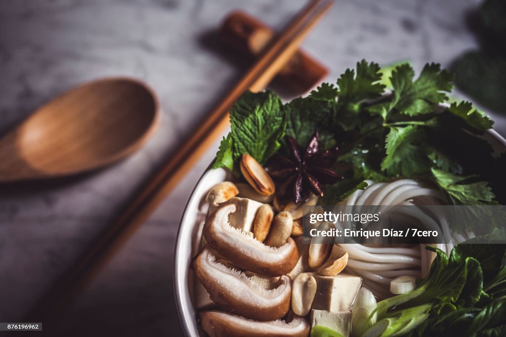 Pho Soup Details with Chopsticks and Spoon