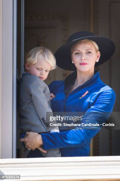 Princess Charlene of Monaco with Prince Jacques of Monaco greet the crowd from the Palace's balcony during the Monaco National Day Celebrations on...