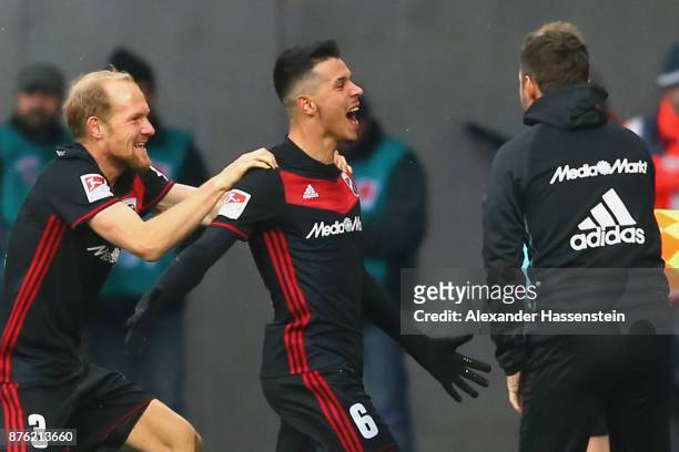 Alfredo Morales of Ingolstadt celebrates scoring the opening goal with his team mate Tobias Levels and head coach Stefan Leitl during the Second...