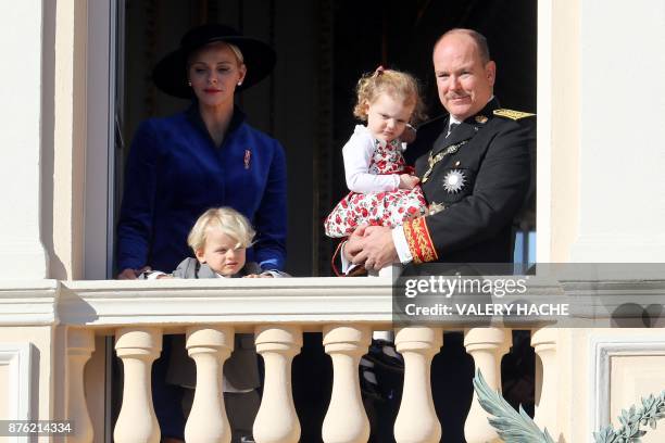 Prince Albert II of Monaco and Princess Charlene of Monaco appear with Prince Jacques and Princess Gabriella on the balcony of the Monaco Palace...