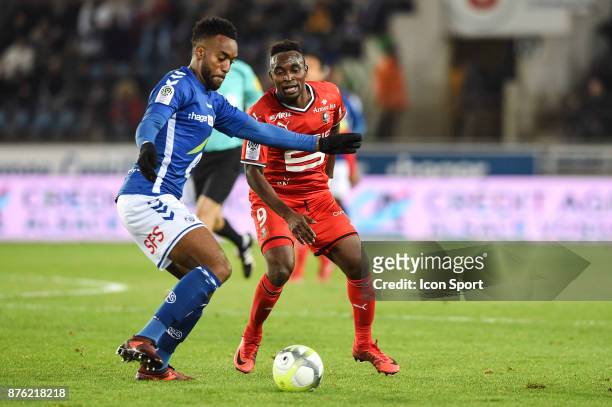 Yoann Salmier of Strasbourg and Firmin Mubele of Rennes during the Ligue 1 match between Strasbourg and Rennes at Stade de la Meinau on November 18,...