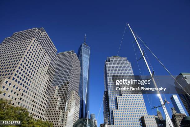 north cove marina on the hudson river at brookfield place, near the world trade center site, with the freedom tower in the background. lower manhattan, new york city - north cove stock pictures, royalty-free photos & images