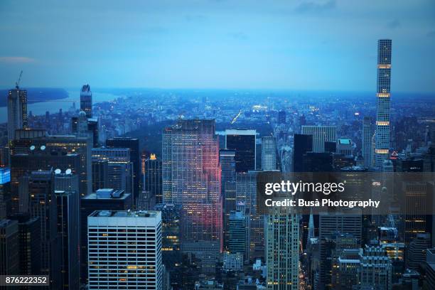 spectacular panoramic view from atop the empire state building at twilight: general electric building, rockefeller center, 432 park avenue, central park. new york city, usa - general electric stock pictures, royalty-free photos & images