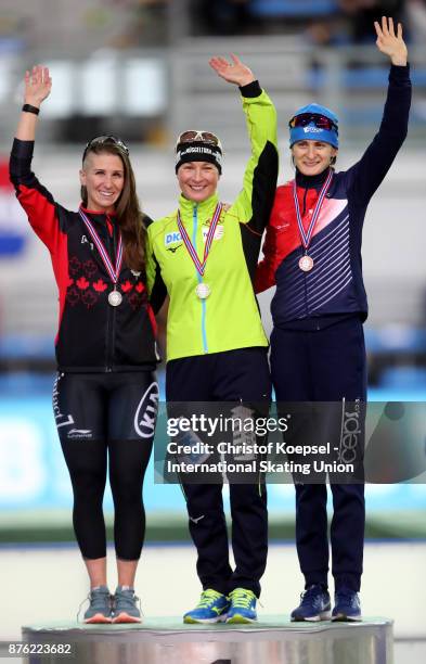 Ivanie Blondin of Canada poses during the medal ceremony after winning the 2nd place, Claudia Pechstein of Germany poses during the medal ceremony...