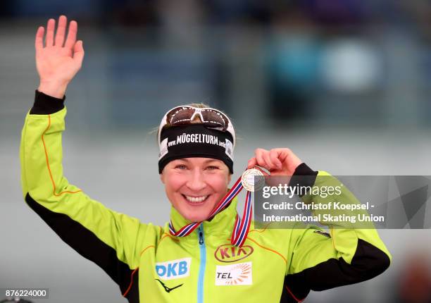 Claudia Pechstein of Germany poses during the medal ceremony after winning the 1st place in the ladies 5000m Division A race during Day 3 of the ISU...