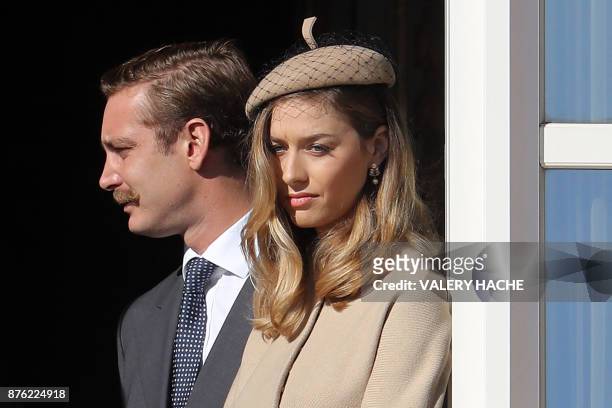 Pierre Casiraghi and Beatrice Casiraghi greet the crowd from the palace's balcony during the Monaco National Day Celebrations on November 19, 2017 in...