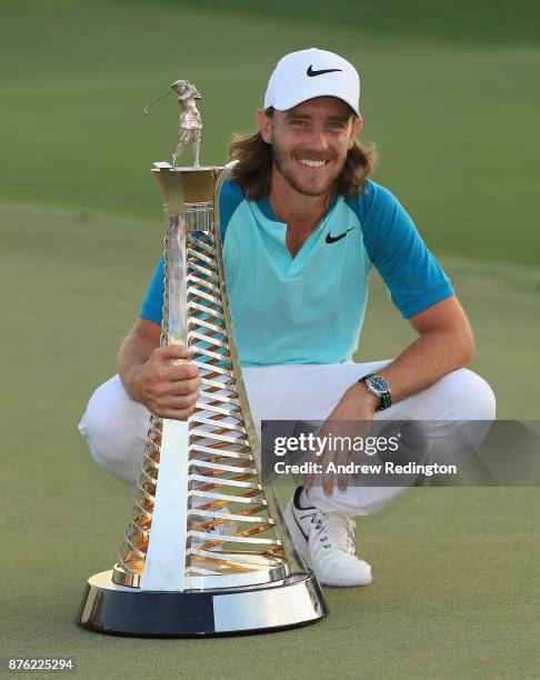 Tommy Fleetwood of England poses with the Race to Dubai trophy after the final round of the DP World Tour Championship at Jumeirah Golf Estates on...