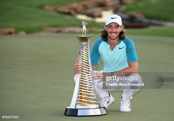 Tommy Fleetwood of England poses with the Race to Dubai trophy during the final round of the DP World Tour Championship at Jumeirah Golf Estates on...