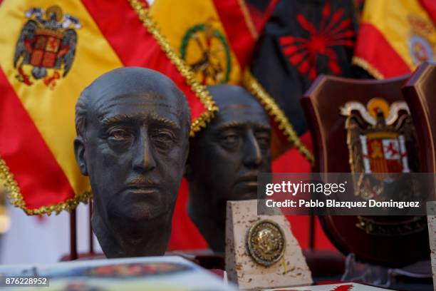 Souvenirs are for sell with the image of Franco and Francoist symbology during a rally commemorating the 42nd anniversary of Spain's former dictator...