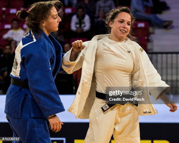 Amelie Stoll of Germany celebrates her victory against Mina Libeer Belgium after throwing her to win the u57kg bronze medal during the 2017 The Hague...