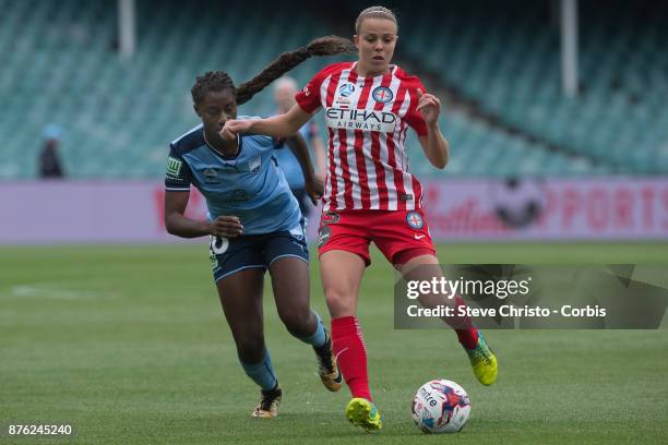 Amy Jackson of the Melbourne City gets past Sydney's Princess Ibini-Isei during the round four W-League match between Sydney FC and Melbourne City FC...