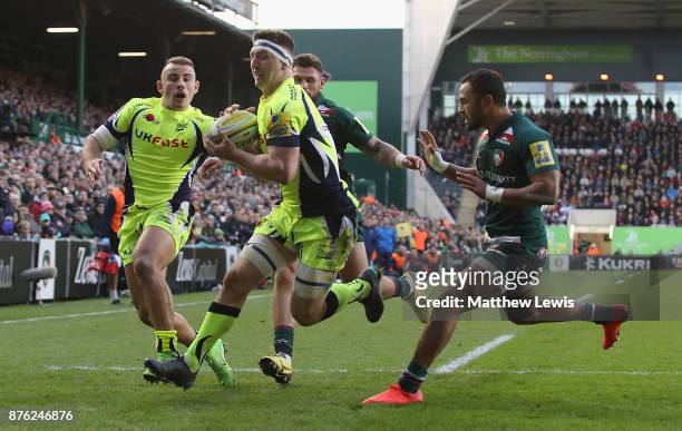 Ben Curry of Sale Sharks collects the kick through to score a try during the Aviva Premiership match between Leicester Tigers and Sale Sharks at...