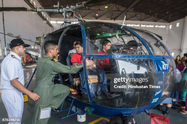 Air Display show for differently-abled children as a part of Navy Day celebrations at Indian Naval Ship Shikra, on November 15, 2017 in Mumbai,...