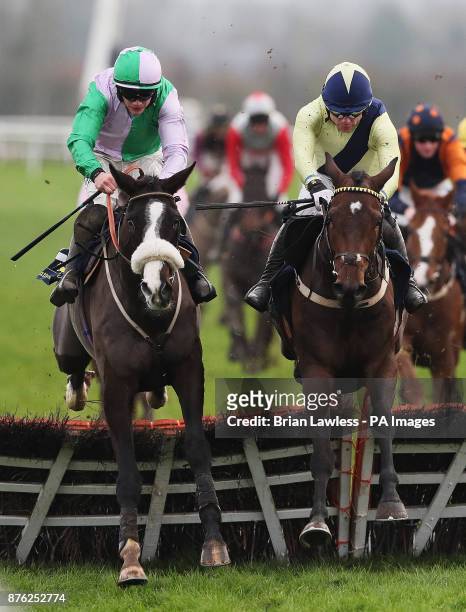 Dom Dolo ridden by Denis O'Regan clears the last on the way to winning the Tattersalls Ireland Irish EBF Auction Maiden Hurdle during day two of the...