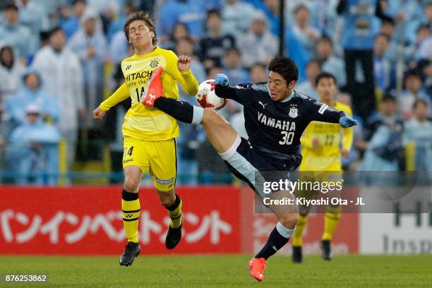 Junya Ito of Kashiwa Reysol and Rikiya Uehara of Jubilo Iwata compete for the ball during the J.League J1 match between Kashiwa Reysol and Jubilo...