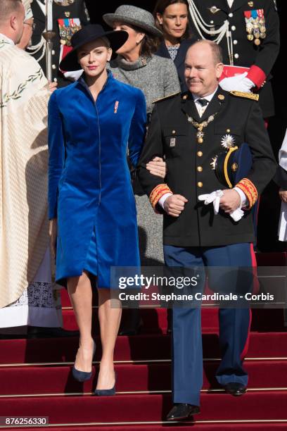 Princess Charlene of Monaco and Prince Albert II of Monaco leave the Cathedral of Monaco after a mass during the Monaco National Day Celebrations on...