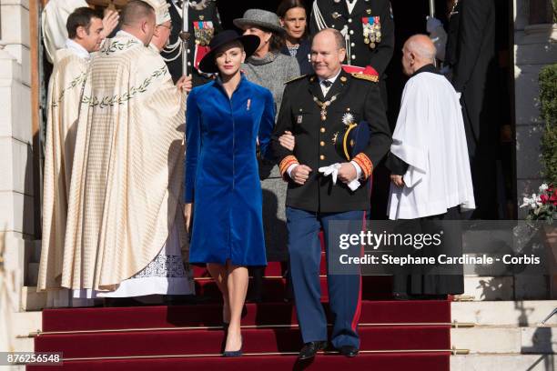 Princess Charlene of Monaco and Prince Albert II of Monaco leave the Cathedral of Monaco after a mass during the Monaco National Day Celebrations on...