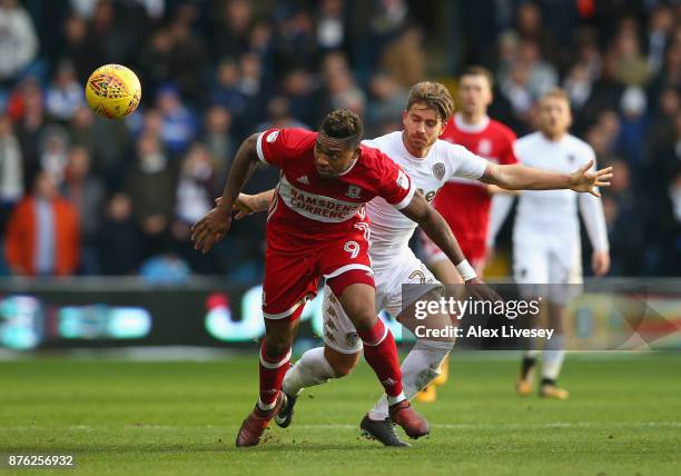 Britt Assombalonga of Middlesbrough beats Gaetano Berardi of Leeds United during the Sky Bet Championship match between Leeds United and...
