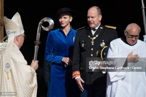 Princess Charlene of Monaco and Prince Albert II of Monaco leave the Cathedral of Monaco after a mass during the Monaco National Day Celebrations on...