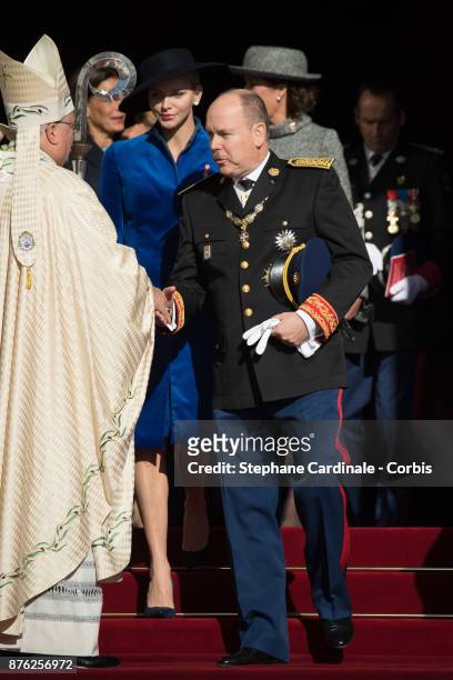 Princess Charlene of Monaco and Prince Albert II of Monaco leave the Cathedral of Monaco after a mass during the Monaco National Day Celebrations on...