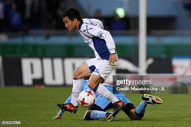 Yasuyuki Konno of Gamba Osaka and Kengo Nakamura of Kawasaki Frontale compete for the ball during the J.League J1 match between Kawasaki Frontale and...