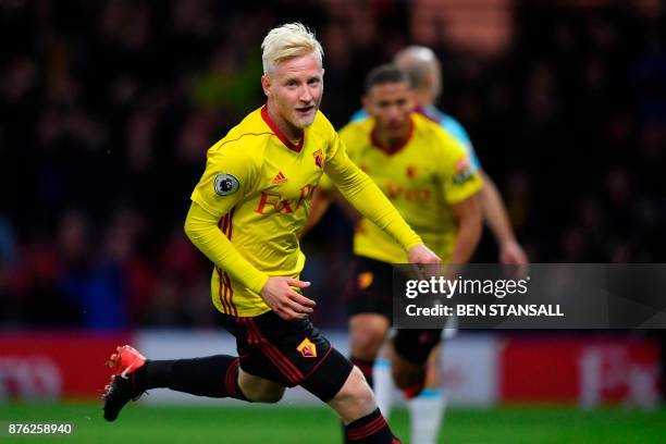 Watford's English midfielder Will Hughes celebrates scoring the opening goal during the English Premier League football match between Watford and...