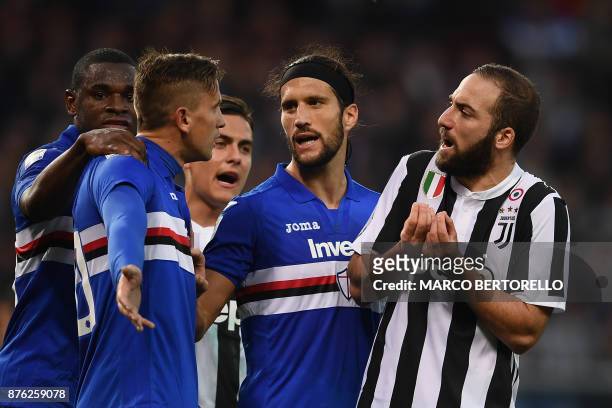 Juventus' forward Gonzalo Higuain from Argentina argues with Sampdoria's midfielder Gaston Ramirez from Colombia during the Italian Serie A football...