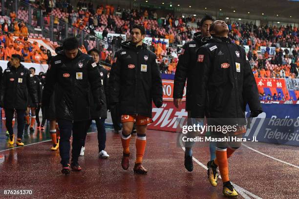 Rony and Albirex Niigata players show dejection after their relegation despite their 1-0 victory in the J.League J1 match between Albirex Niigata and...