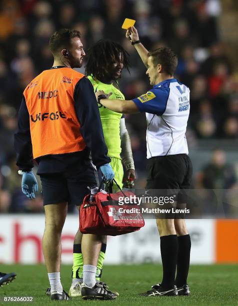 Referee Luke Pearce ishows Marland Yarde of Sale Sharks a yellow card during the Aviva Premiership match between Leicester Tigers and Sale Sharks at...