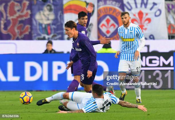 Federico Chiesa of ACF Fiorentina competes for the ball whit Federico Viviani of Spal during the Serie A match between Spal and ACF Fiorentina at...