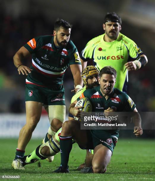 Joe Ford of Leicester Tigers is tackled by Josh Strauss of Sale Sharks during the Aviva Premiership match between Leicester Tigers and Sale Sharks at...