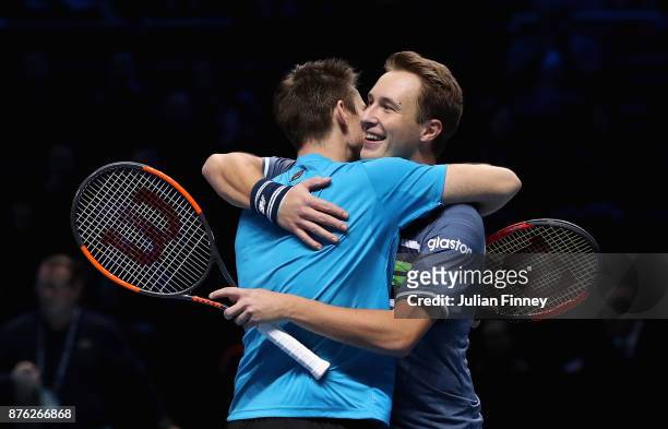 Henri Kontinen of Finland and John Peers of Australia celebrate victory following the doubles final against Marcelo Melo of Brazil nd Lukasz Kubot of...