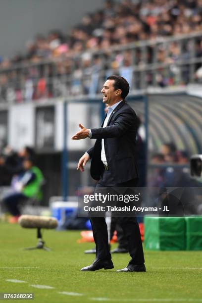 Head coach Massimo Ficcadenti of Sagan Tosu gestures during the J.League J1 match between Sagan Tosu and FC Tokyo at Best Amenity Stadium on November...