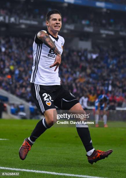 Santi Mina of Valencia CF celebrates after scoring his team's second goal during the La Liga match between Espanyol and Valencia at Cornella - El...